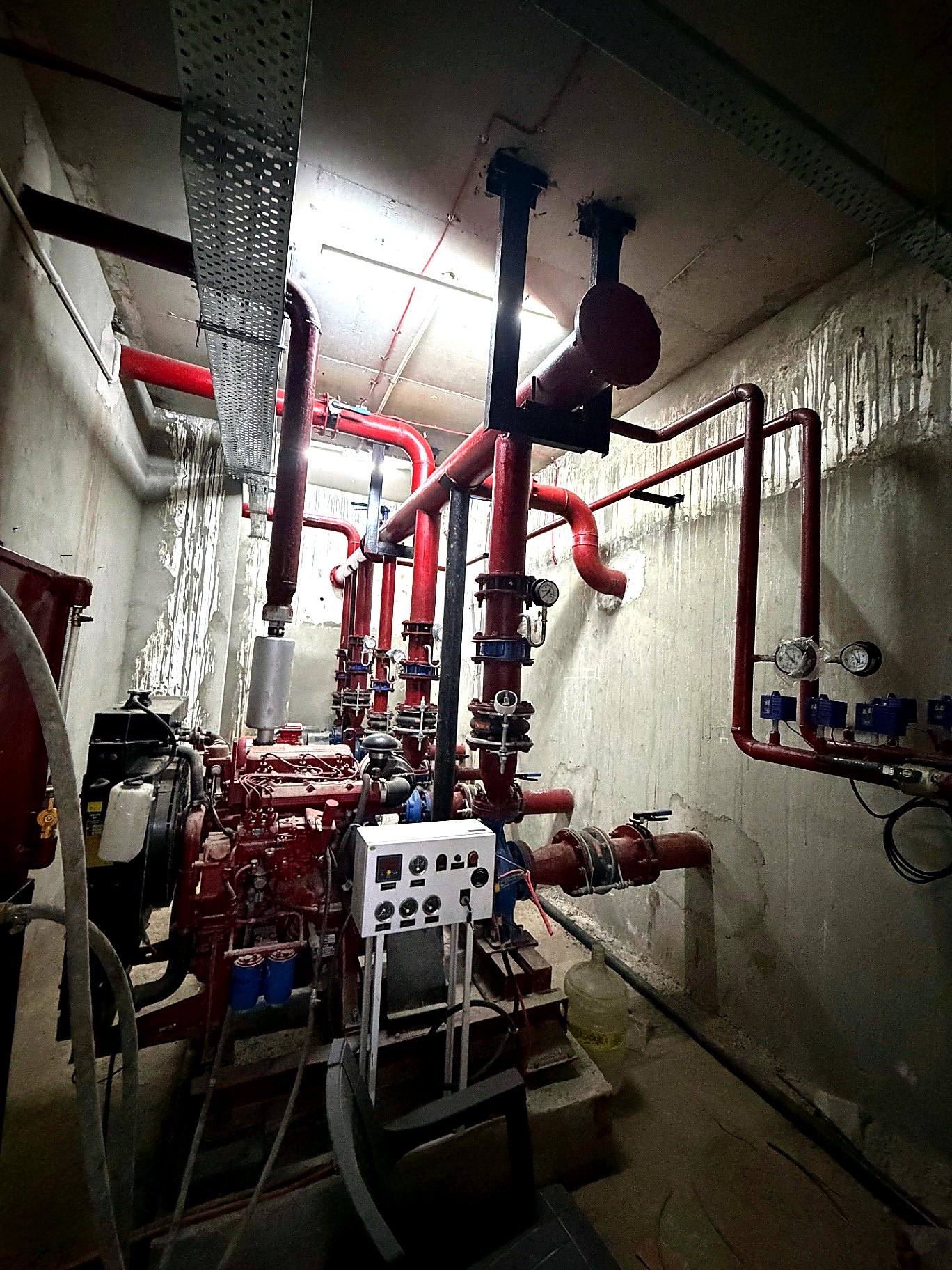 Fire pump room with diesel-engine driven fire pump and headers at the Okhla Phase-1 project by Decon Infratech