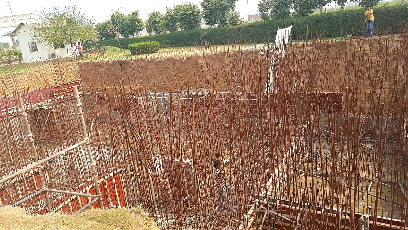 Civil construction of the 900 KLD Sewage Treatment Plant tank structure at AMD Estates